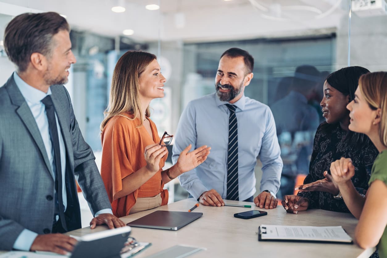 Global expansion strategies - A team of business owners having a meeting in an office.